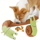 Corgi puppy playing with interactive snail dog toy, featuring plush design and hidden treats, perfect for pet enrichment and mental stimulation.