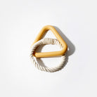 Triangle-shaped wooden teether with a natural rope ring, ideal for baby teething relief. Eco-friendly, non-toxic baby toy for soothing gums.