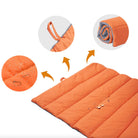 Orange foldable waterproof outdoor dog mat, durable travel pet accessory with water-resistant fabric.