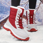 Red and white winter snow boots with fur lining, featuring durable soles and lace-up design, perfect for cold weather and outdoor activities.