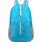 Bright blue backpack with front zipper pocket, adjustable straps, and side mesh pockets. Ideal for travel, school, or hiking. Durable and lightweight design.