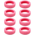 Pink silicone tire-shaped teething rings, set of eight, textured surface, baby teether toy, BPA-free, safe for infants, soothing gum relief.