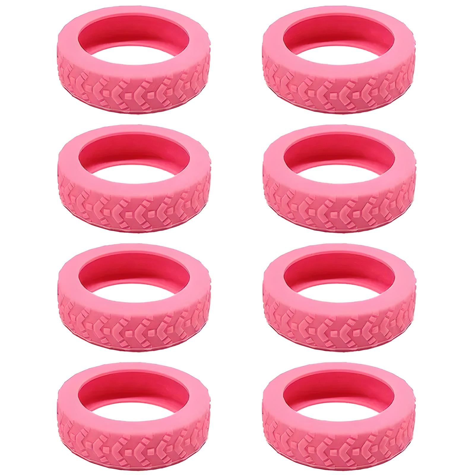 Pink silicone tire-shaped teething rings, set of eight, textured surface, baby teether toy, BPA-free, safe for infants, soothing gum relief.