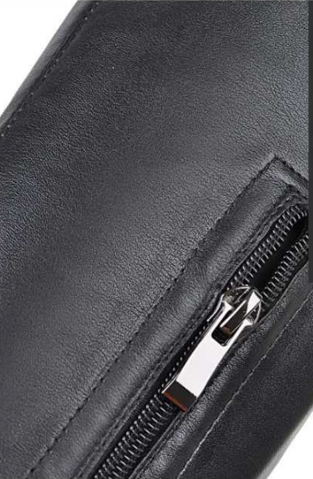 Close-up of a black leather wallet with a sleek silver zipper, showcasing premium craftsmanship and stylish design. Perfect for fashion accessories.