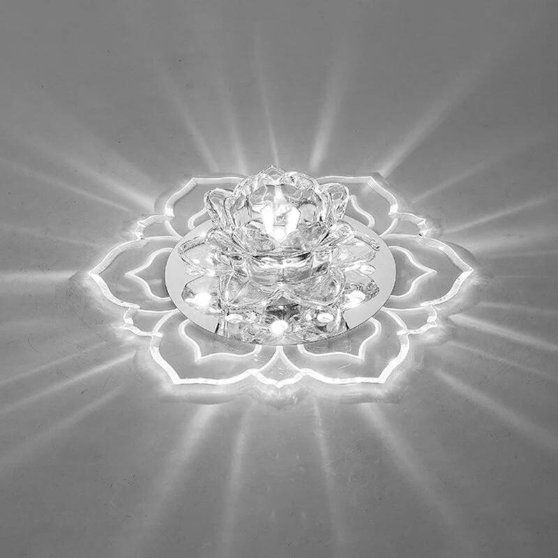 Crystal lotus flower LED light fixture with intricate petal design, emitting radiant glow. Perfect for home decor, meditation spaces, ambient lighting.