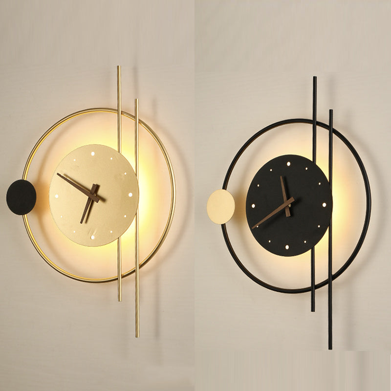 Modern wall clock set with geometric design, featuring gold and black circular frames, minimalist style, and LED backlighting. Perfect for contemporary decor.