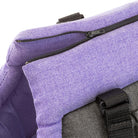 Close-up of a purple and gray backpack with a zippered pocket and black buckle, highlighting durable fabric and secure storage. Perfect for travel or school.