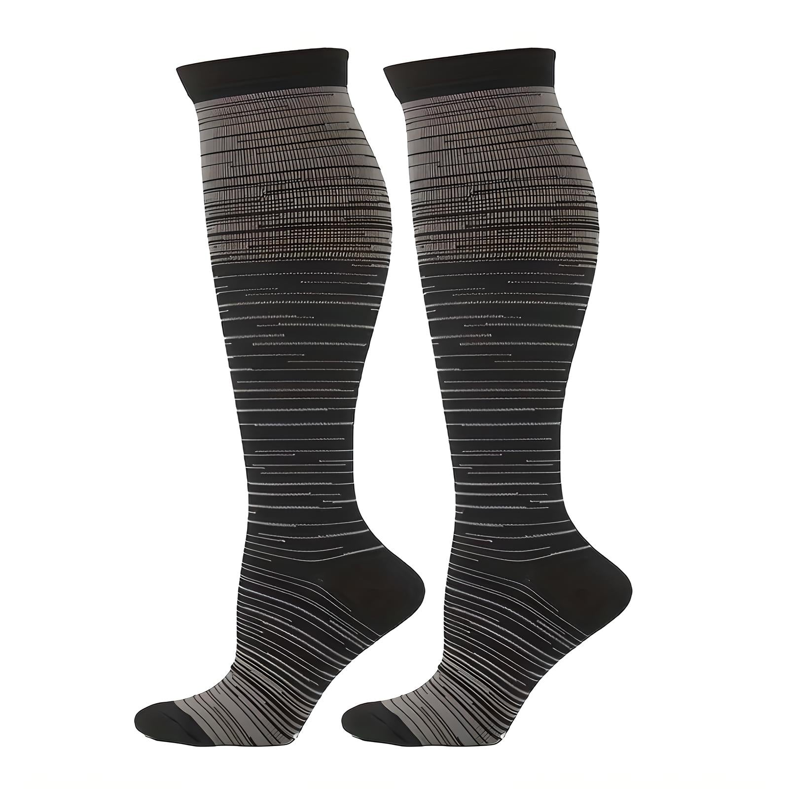 Black knee-high compression socks with gradient stripe pattern, designed for improved circulation and comfort. Ideal for travel, sports, and daily wear.