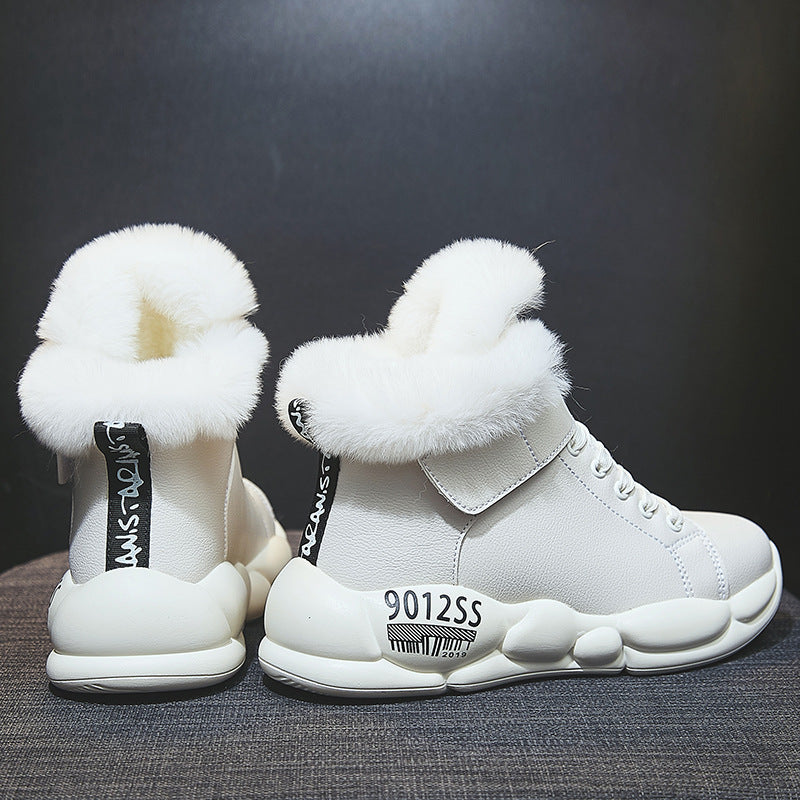 White fur-lined high-top sneakers with chunky soles, featuring unique design elements and text details, perfect for winter fashion and streetwear style.