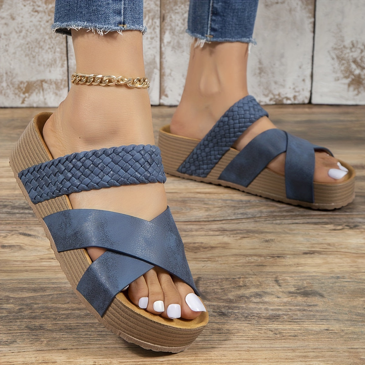 Women's blue wedge sandals with braided straps, open toe design, and cork sole. Perfect for casual summer fashion and comfortable everyday wear.