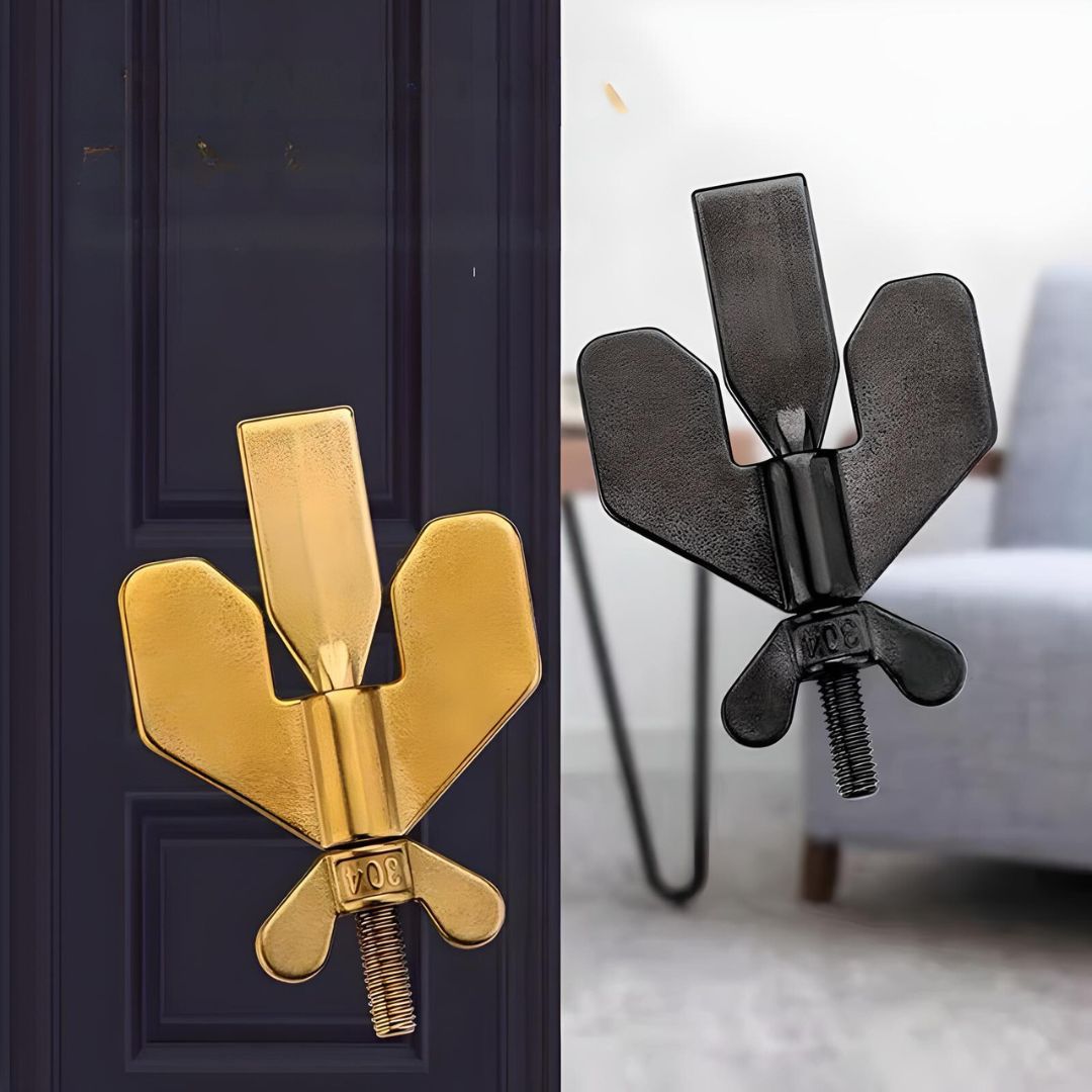 Gold and black door hinge stopper, butterfly design, modern home decor accessory, durable metal construction, easy installation, stylish door hardware.