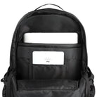 Black backpack interior with laptop and tablet compartments, featuring a sleek design for tech storage. Ideal for students and professionals.