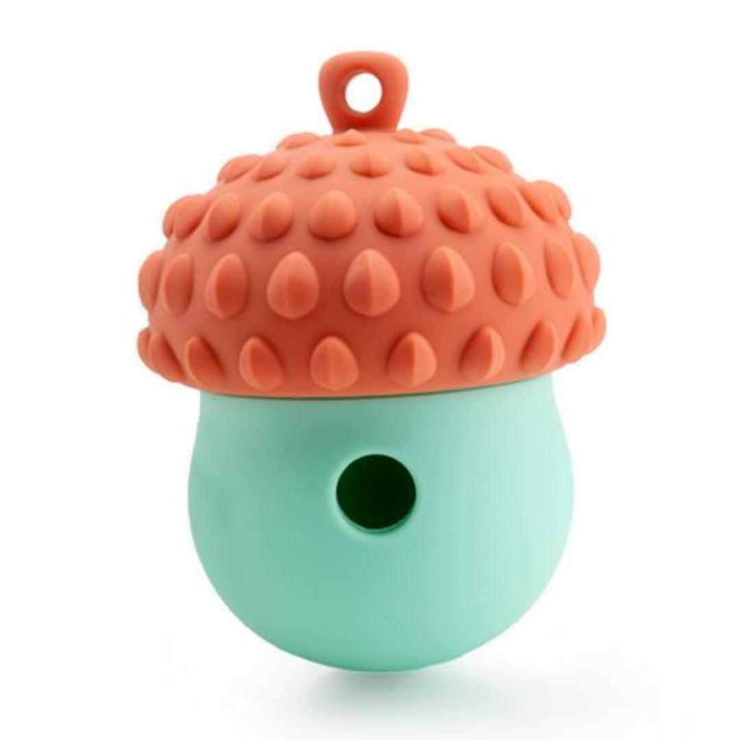 Silicone acorn-shaped baby teether in orange and mint green, featuring a textured surface for soothing gums. Safe, BPA-free infant teething toy.