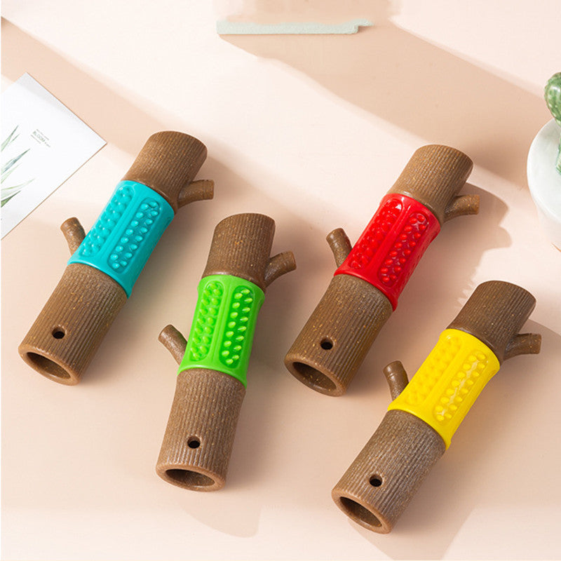 Colorful dog chew toys shaped like logs with textured surfaces, featuring red, yellow, green, and blue accents, ideal for pet dental health.