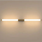 Modern LED wall light fixture with sleek brass accents, minimalist design, and warm white illumination, ideal for contemporary home decor lighting.