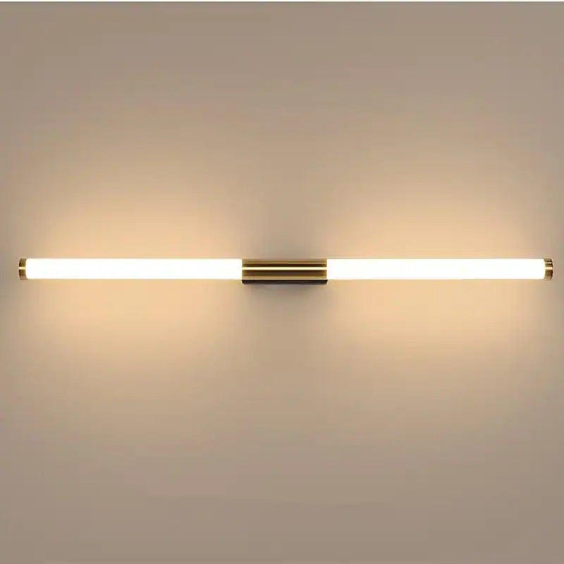 Modern LED wall light fixture with sleek brass accents, minimalist design, and warm white illumination, ideal for contemporary home decor lighting.