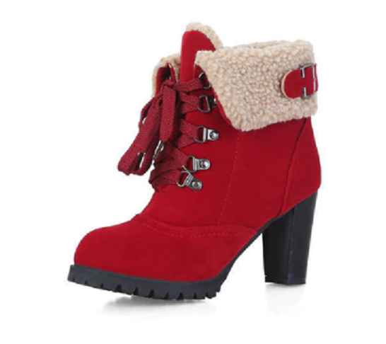 Red high-heeled winter boot with faux fur lining, lace-up front, and buckle detail. Stylish women's footwear for cold weather. Fashionable and cozy.