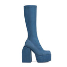 Blue denim platform knee-high boot with chunky heel, modern fashion footwear, stylish women's shoe, trendy high heel boot, unique design.