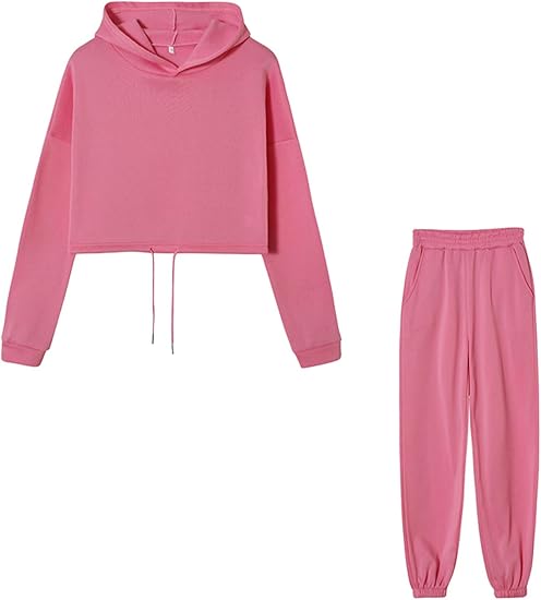 Pink women's tracksuit set with cropped hoodie and jogger pants, featuring drawstring waist and cuffs. Comfortable loungewear, casual fashion.