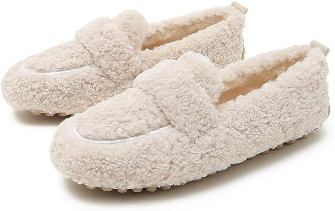 Cozy beige faux fur slippers with non-slip soles, perfect for indoor comfort. Ideal women's winter footwear, plush and warm.