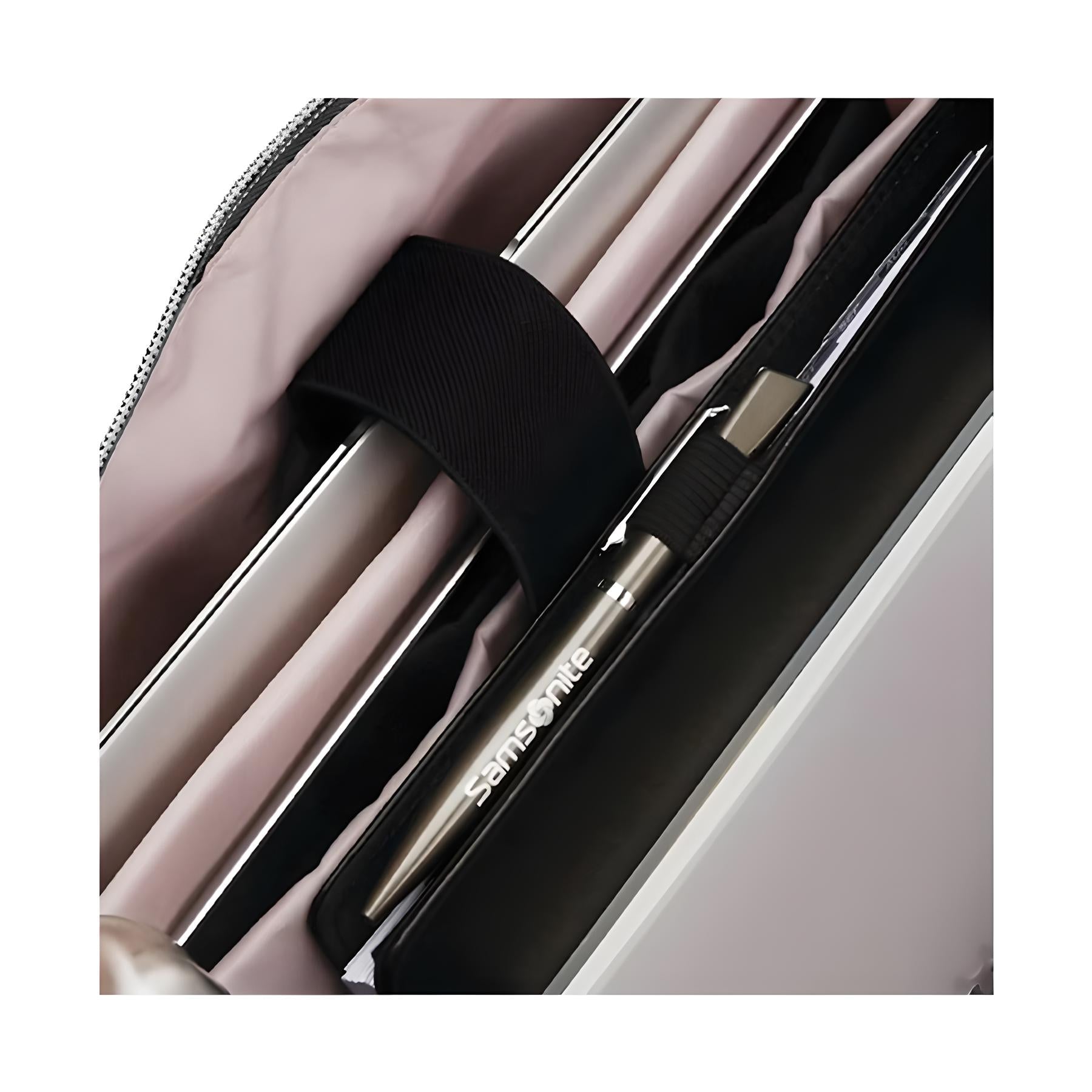 Samsonite pen inside an organized laptop bag compartment, showcasing sleek design and premium quality. Ideal for business professionals and travelers.