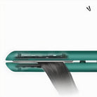 Green hair straightener in use, smoothing black hair. High-quality ceramic plates, sleek design, professional styling tool for salon results.