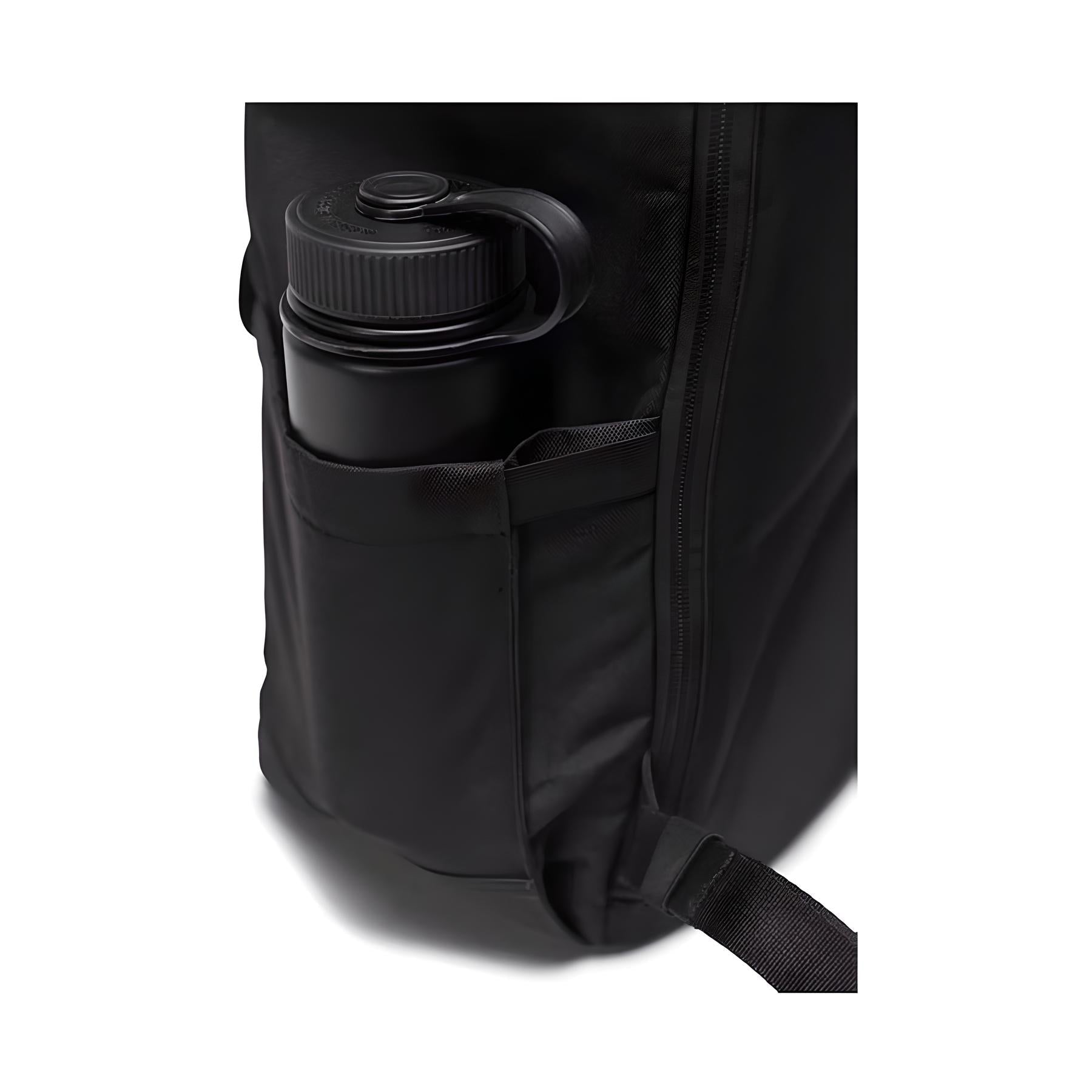 Black backpack with side pocket holding a reusable water bottle. Durable, stylish travel gear, perfect for hiking, commuting, and outdoor activities.