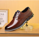 Brown leather men's dress shoe with lace-up design, featuring a sleek finish and modern sole, displayed on a decorative stand. Perfect for formal occasions.