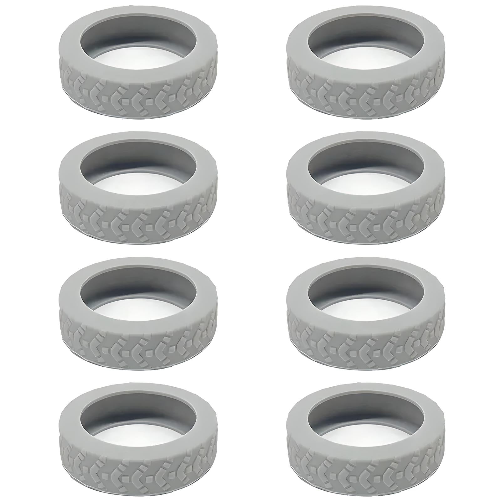 Eight gray rubber caster wheels with textured treads, arranged in two vertical rows. Ideal for furniture, carts, and industrial equipment mobility.