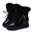 Black women's winter platform boots with faux fur trim, lace-up front, and side zipper. Stylish snow boots for warmth and comfort.