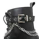 Black leather combat boot with silver buckle, eyelets, and chain detail. Stylish punk footwear, edgy fashion accessory, durable design.