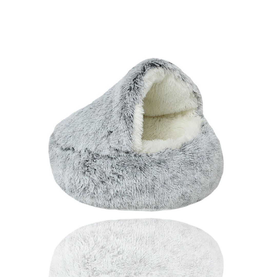 Cozy gray faux fur cat bed cave with plush interior, perfect for pet comfort and warmth. Ideal for small pets seeking a soft, secure sleeping space.