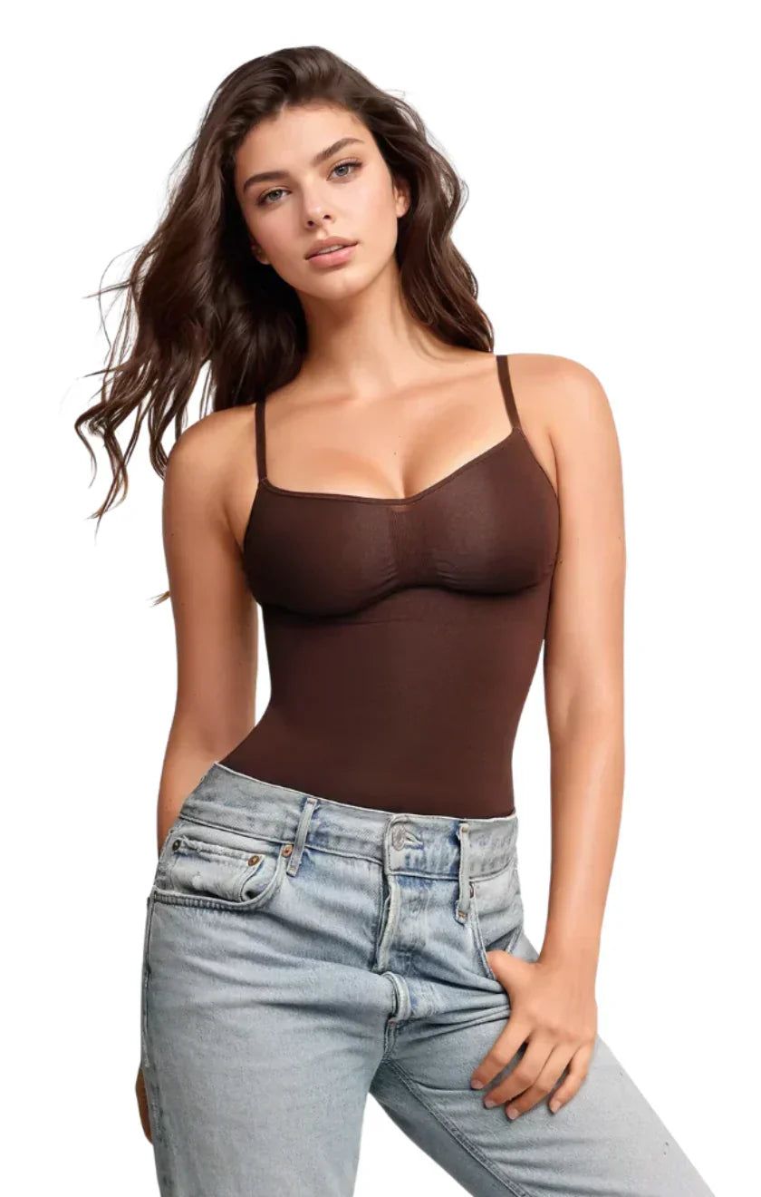 Woman in brown spaghetti strap bodysuit and light blue jeans, casual fashion, isolated on white background, stylish women's clothing.