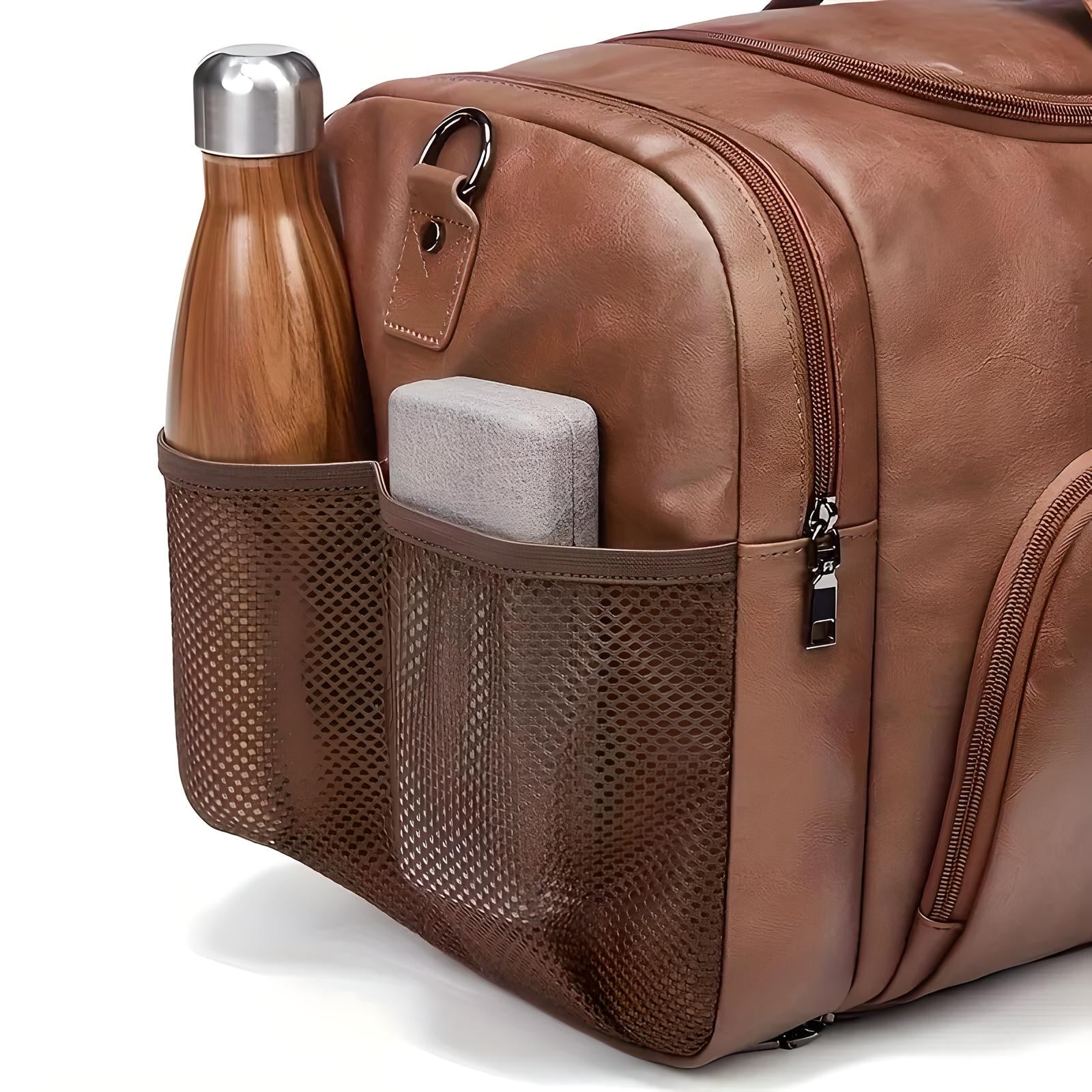 Brown leather travel backpack with side mesh pocket holding a stainless steel water bottle and a gray portable charger. Durable, stylish, and functional design.