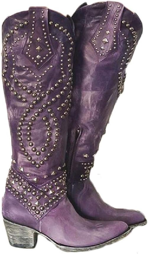 Purple leather cowboy boots with studded embellishments, high heel, and intricate western design. Fashionable women's footwear for country style.