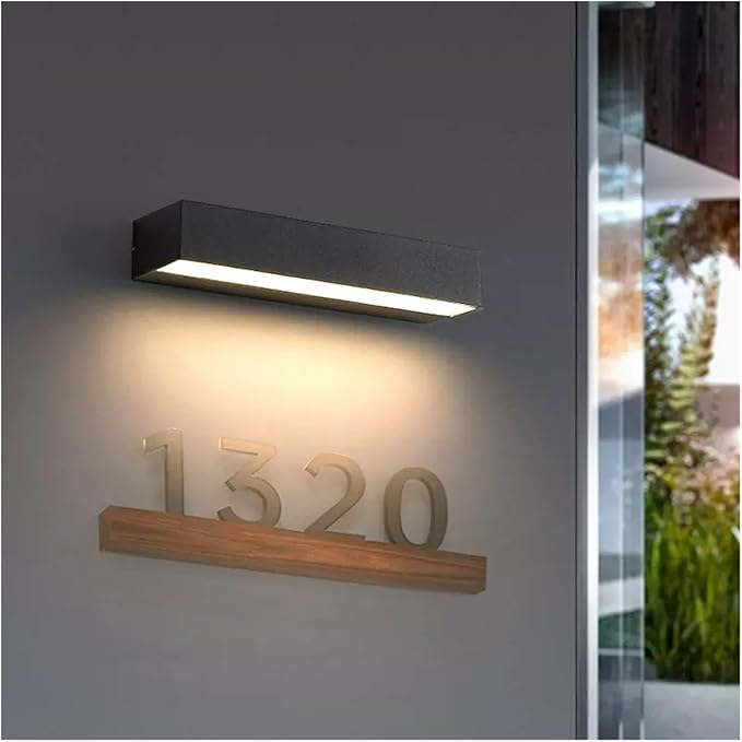 Modern LED wall light illuminating house number 1320 on a sleek wooden plaque, ideal for outdoor home decor and energy-efficient lighting solutions.