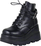 Black leather platform ankle boot with lace-up front, double buckle straps, and chunky sole. Women's fashion footwear, trendy goth style.