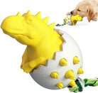 Yellow dinosaur dog toy with spiked egg design, featuring a durable rope for interactive play. Ideal for puppies and small dogs.