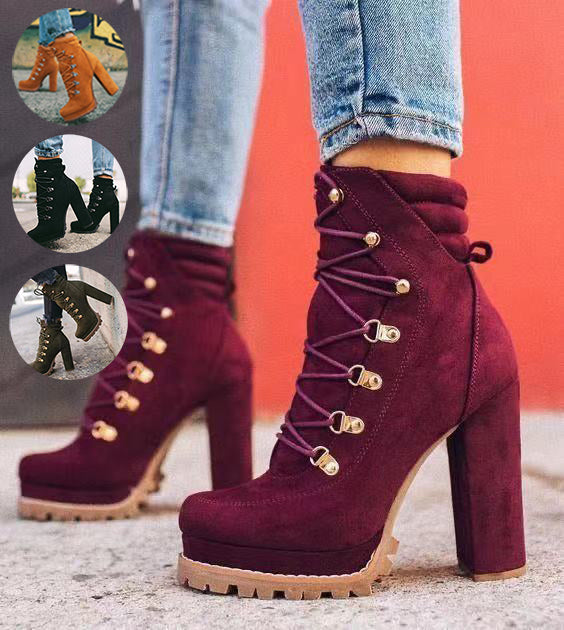 Women's burgundy high-heeled boots with lace-up design and gold eyelets, featuring a chunky heel and rugged sole. Fashionable footwear for fall.