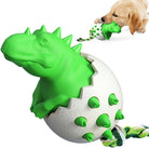 Green dinosaur dog toy with rope, durable chew toy for aggressive chewers, interactive pet play, puppy teething aid, spiked egg design.