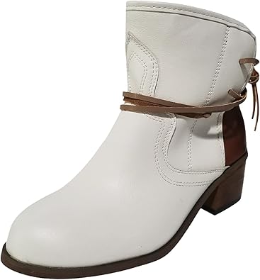 White leather ankle boot with brown heel and decorative strap, featuring a Western-inspired design. Perfect for fashion-forward, casual wear.