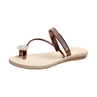 Women's beige flip flop sandal with metallic brown straps, rhinestone embellishments, and a textured sole. Stylish summer footwear.