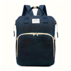 Dark blue backpack with front pocket, beige zippers, and "You Are My Sunshine" label. Ideal for travel, school, or work. Durable and stylish design.