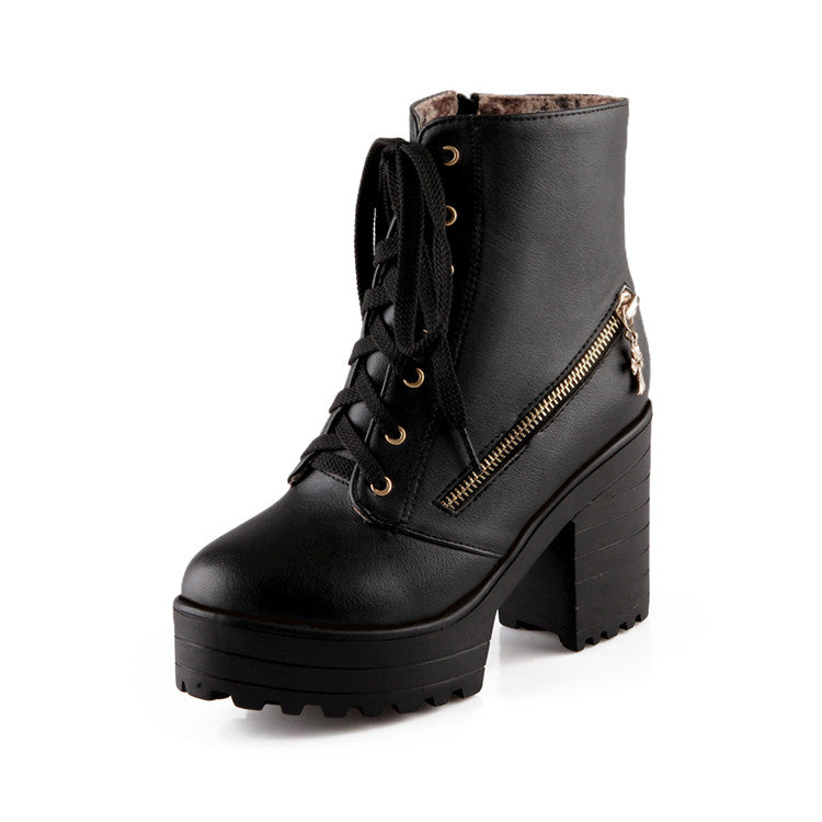 Black leather platform ankle boot with chunky heel, lace-up front, and side zipper. Stylish women's footwear, perfect for fall fashion trends.