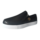 Black slip-on sneaker with textured fabric, side zipper, and white rubber sole. Stylish casual footwear for men. Comfortable and versatile design.