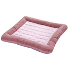 Pink striped pet bed with quilted cushion, ideal for small dogs and cats. Comfortable, stylish, and durable pet bedding for home use.