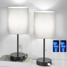 Modern bedside table lamps with USB charging ports, touch control, and fabric shades. Ideal for bedroom or living room decor. Energy-efficient lighting.