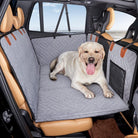 Dog car seat cover with a happy Labrador, waterproof and scratchproof, protecting backseat of SUV. Ideal pet travel accessory for safe journeys.