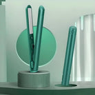 Green hair straightener on a modern display stand, featuring sleek design and ceramic plates. Ideal for styling, salon-quality results, and hair care.