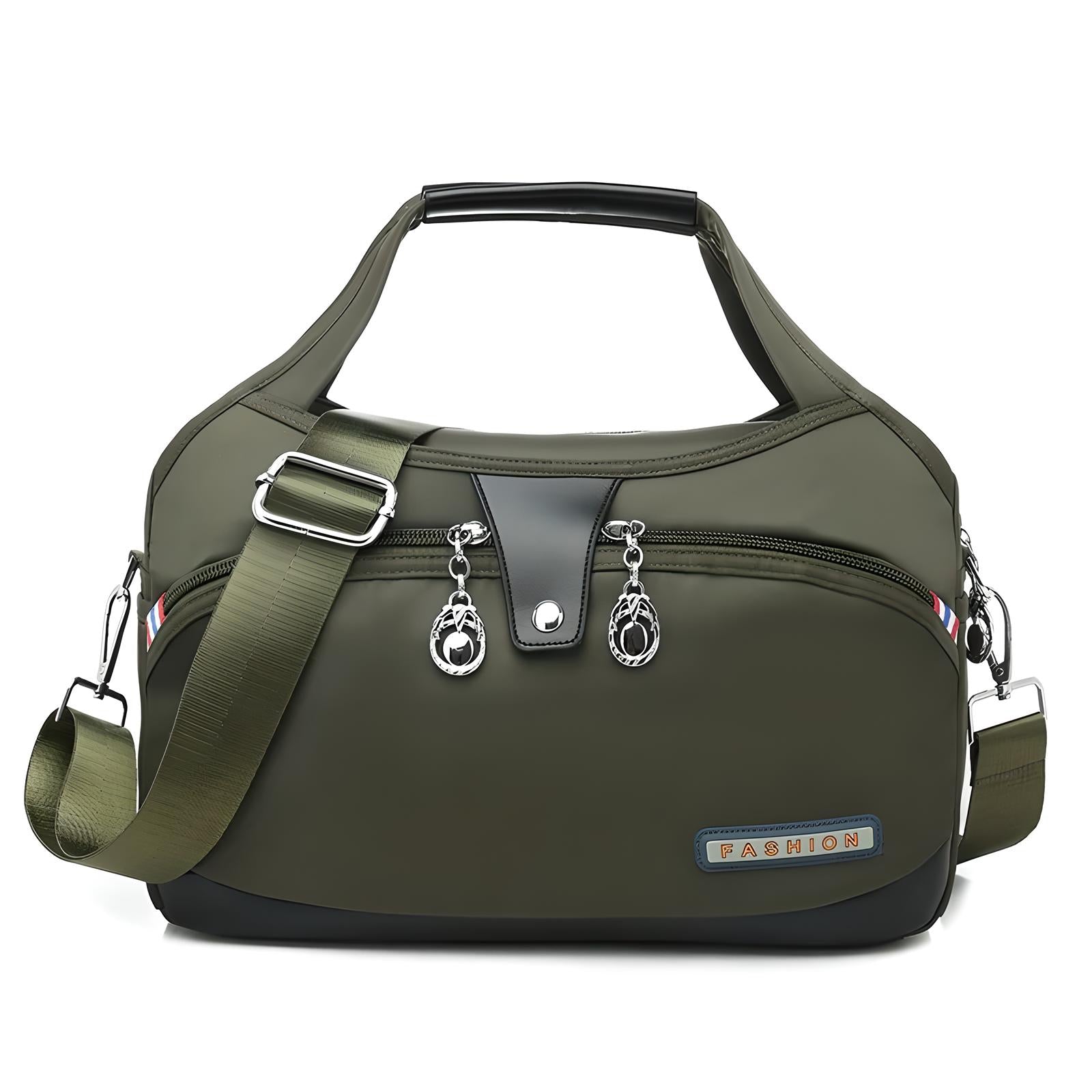 Olive green fashion handbag with adjustable shoulder strap, multiple zippered compartments, and stylish metal accents. Perfect for travel or daily use.